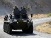 Turkish army BTR-60 wheeled armoured personnel carrier picture . A Turkish armoured vehicle moves towards the Turkish-Iraq border on February 25. Turkish troops, backed by fighter jets, have closed in on a main rebel base in their offensive against Kurdish separatists in northern Iraq that has so far claimed at least 170 lives.