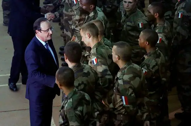 The soldiers' deaths in the capital were announced just before French President Francois Hollande's office said he would make a quick stop-over in Bangui on his way back from a memorial service for the late Nelson Mandela in South Africa.