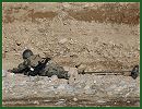 Soldiers from the Afghan National Army’s 8th Commando Kandak found and destroyed a rocket cache in Tarin Kowt district, February 23, 2012.