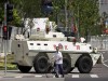 Armoured personnel carries vehicle (APC) from the Chinese Army and police are deployed around the Olympic Central Area ahead of the Beijing 2008 Olympic Games August 2, 2008.