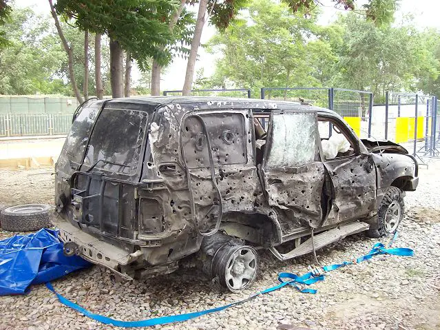 Armoured vehicle with Saint-Gobain Sully glasses, was hit by a vehicle born improvised explosive device (VBIED) in Afghanistan on a motorbike. Both passengers survived and drove away from the incident. 