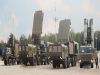 The second regiment equipped with advanced S-400 Triumf air defense missile systems has been put into combat service in Russia, the defense minister said on Tuesday. In 2007, Russia successfully conducted live firing tests of the S-400 air defense complex at the Kapustin Yar firing range in south Russia's Astrakhan Region, and deployed the first missile regiment equipped with the new system to protect the airspace surrounding Moscow and industrial zones in the center of Russia's European territory. The S-400 Triumf (SA-21 Growler) air defense system is expected to form the new cornerstone of Russia's theater air and missile defenses up to 2020 or even 2025. The S-400 is designed to intercept and destroy airborne targets at a distance of up to 400 kilometers (250 miles), twice the range of the U.S. MIM-104 Patriot, and 2.5 times that of the S-300PMU-2. The system is also believed to be able to destroy stealth aircraft, cruise missiles, and ballistic missiles, with an effective range of up to 3,500 kilometers (2,200 miles) and a speed of up to 4.8 kilometers (3 miles) per second. A regular S-400 battalion comprises at least eight launchers with 32 missiles and a mobile command post, according to various sources. The new state arms procurement program until 2015 stipulates the purchase of enough S-400 air defense systems to arm 18 battalions during this period. 