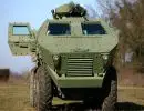 Le véhicule blindé à roues Lazar BTR-SR-8808 8x8 représente une famille de véhicules à roues, qui a été conçue en fonction des nouvelles tendances du monde moderne, et destinée à être utilisée dans un nombre varié de tâches sur les nouveaux théâtre d’opérations et conflits. Le concept et les solutions techniques du véhicule ont été spécialement ajustés en fonction des besoins de l’infanterie moderne et des unités spéciales chargés d’effectuer des missions anti-terroristes ou de maintien de la paix. En ce qui concerne la fabrication du véhicule, un accent tout particulier a été apportée en ce qui concerne la mobilité, la protection, l’armement, et la possibilité de transporter 10 soldats entièrement équipés. Le Lazar dispose de deux larges portes, montées à l’arrière du véhicule, permettant l’embarquement et le débarquement rapide des troupes embarqués. Le compartiment équipage comporte également des fenêtres blindées, avec des trappes de tir, permettant d’avoir une vision large et un champ d’observation, avec la possibilité de l’utilisation des armes des fantassins embarqués.
