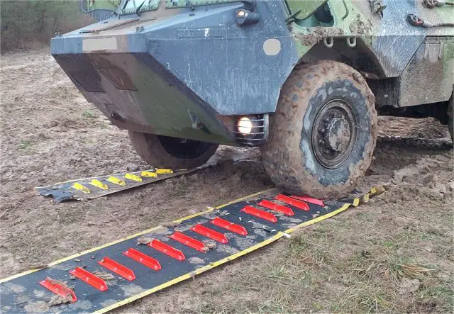 The French Company Musthane has developed a new combat vehicle recovery mats to get out vehicles of sand or mud marketed under the name of Mustmove DFP. The product is available in two different widths for light tactical vehicles or tracked armoured. 