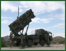 U.S. and Dutch NATO troops were massed on Turkey's Syrian border Friday amid fears besieged President Bashar Assad was poised to use chemical weapons. The soldiers were beefing up Turkey's border and readying Patriot missiles three days after NATO agreed to deploy the MIM-104 Patriot surface-to-air missile system in Turkey.