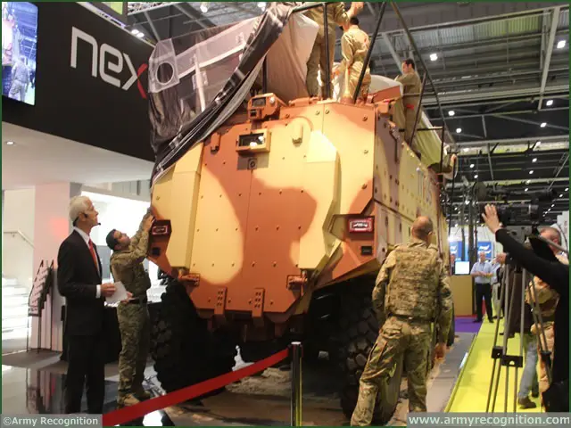 United Kingdom, London. At DSEI 2013, French manufacturer Nexter unveils its new armoured vehicle TITUS (Tactical Infantry Transport & Utility System) for the French Army tender VBMR (Véhicule Blindé Multi-Rôles).