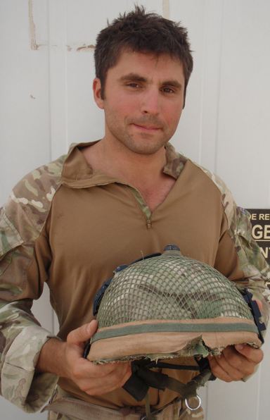 A British soldier has had a miraculous escape after the strap of his helmet Mark 7 was shot off during his first patrol with his new unit in Helmand province. 