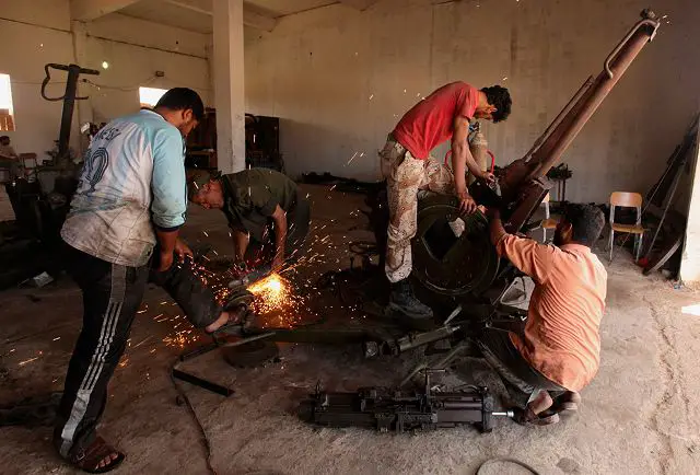 In the city of Benghazi the rebels organize themselves, and workshops of local made weapons and armoured vehicle are created. Mechanics and engineers manufacture weapons to fight the heavy vehicles as main battle tanks of Kaddafi Forces.