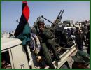 In Libya, convoys of jubilant rebel forces are pushing westwards into the heartland of the Gaddafi regime. It comes after they reportedly took control of the eastern coastal towns of Ras Lanuf, Brega and Uqayla. Pressure from the allied airstrikes forced government forces to fall back. 