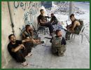 Free Syrian army soldiers used tanks seized in previous clashes with government troops to pound the Menagh military airport, the opposition Syrian Observatory for Human Rights said. The base is north of Aleppo, Syria's commercial capital. The main military airfield in the region is southeast of the city.
