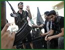 Helicopter gunships opened fire over Aleppo on Sunday, July 29, 2012, and the thud of artillery boomed across neighborhoods as government forces and rebels fought for control of Syria's second city. 