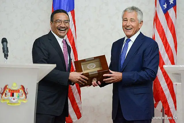 United States and Malaysian defence officials said Sunday that the two countries would continue to boost military ties and eyes on more areas for cooperation. Speaking at a joint press conference with his Malaysian counterpart Hishammuddin Hussein, U.S. Secretary of Defense Chuck Hagel said the United States is committed to strengthening the military partnership with Malaysia. 