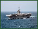 U.S. officials say the Navy is beefing up its presence in the Persian Gulf region, increasing the number of aircraft carriers from one to two. The USS Harry S Truman has arrived in the Arabian Sea and was scheduled to take the place of the USS Nimitz, which was supposed to head home. The Navy has ordered the Nimitz, which is in the Indian Ocean, to stay for now. 