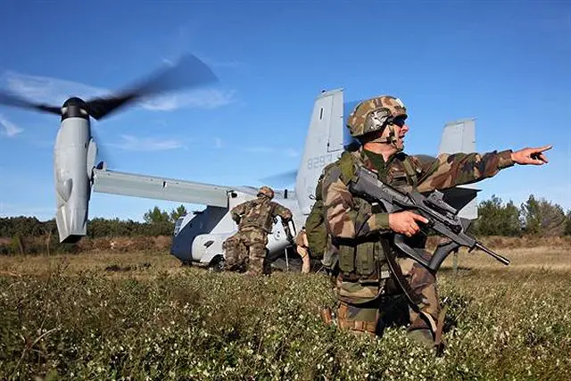 Legionnaires from the 2nd Foreign Infantry Regiment of France's 6th Light Armored Brigade set up landing zone security for an MV-22B Osprey with Special-Purpose Marine Air-Ground Task Force Crisis Response Oct. 30, 2013, at Camp des Garrigues, France.