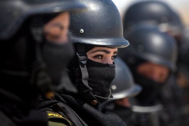 Palestinian women who will become a part of the elite Presidential Guard stand during a training in Jericho, West Bank, on April 6, 2014. Twenty-five Palestinian women are set to become the first female members of the Presidential Guards, a Palestinian elite force of 2,600 men.