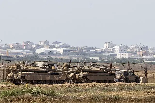 Israeli army has sent troops to the border with the Gaza Strip, raising the possibility of an expanded operation in the Palestinian territory in response to intensifying rocket fire. Thursday's movement of tanks and artillery forces came after 11 Palestinians were wounded in Israeli air raids on Gaza, as Palestinians prepared for the funeral of a teenager who was killed in occupied East Jerusalem.