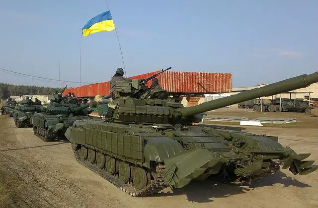 Ukraine began military drills as Russian forces tightened their hold on the Crimean peninsula and the Foreign Ministry in Moscow warned of "lawlessness" in the former Soviet republic's eastern provinces.