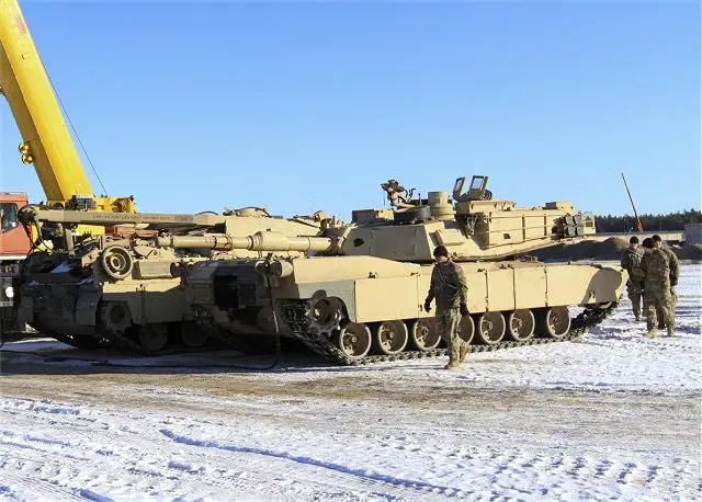 US Army soldiers of 68th Armor Regiment with M1A2 Abrams and M2A3 Bradley on ground in Latvia 640 001