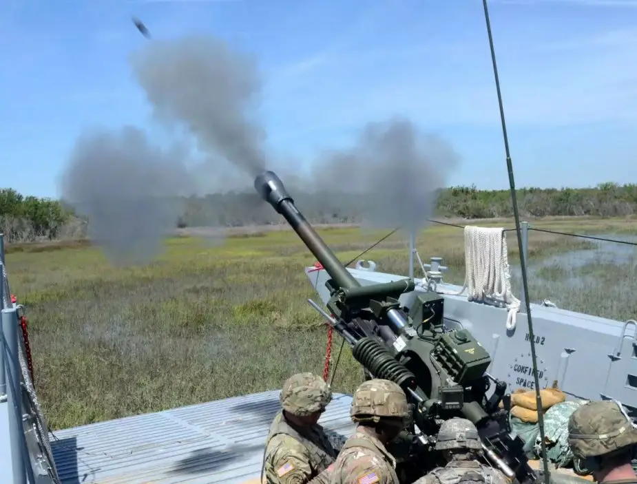 US field artillery fired M119 howitzer from landing craft in Operation Gator 2