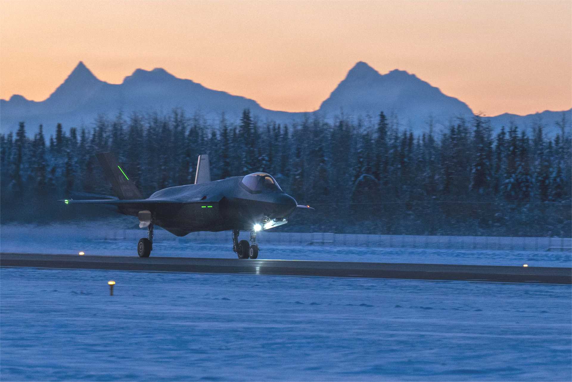A U.S. Air Force F-35A Lightning II from the 354th Fighter Wing touches down at Eielson Air Force Base, Alaska, following Arctic flight operations during Operation TUNDRA MERLIN on December 9, 2025.