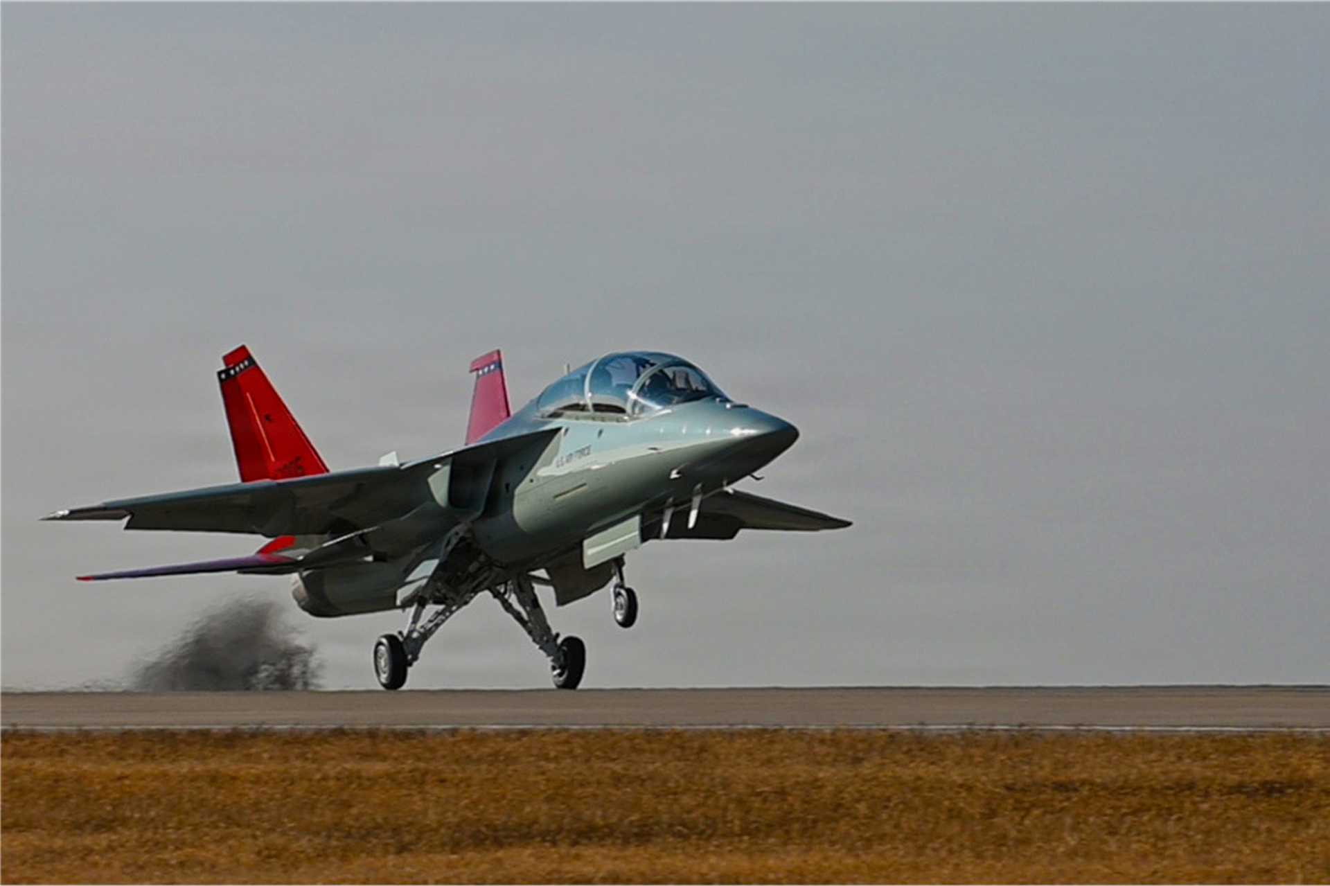 The T-7A RedHawk touches down for the first time at Vance Air Force Base, Oklahoma, on December 3, 2025. As the T-38 Talon nears retirement, the RedHawk advances its legacy with modern capabilities and a name that pays tribute to the Tuskegee Airmen.