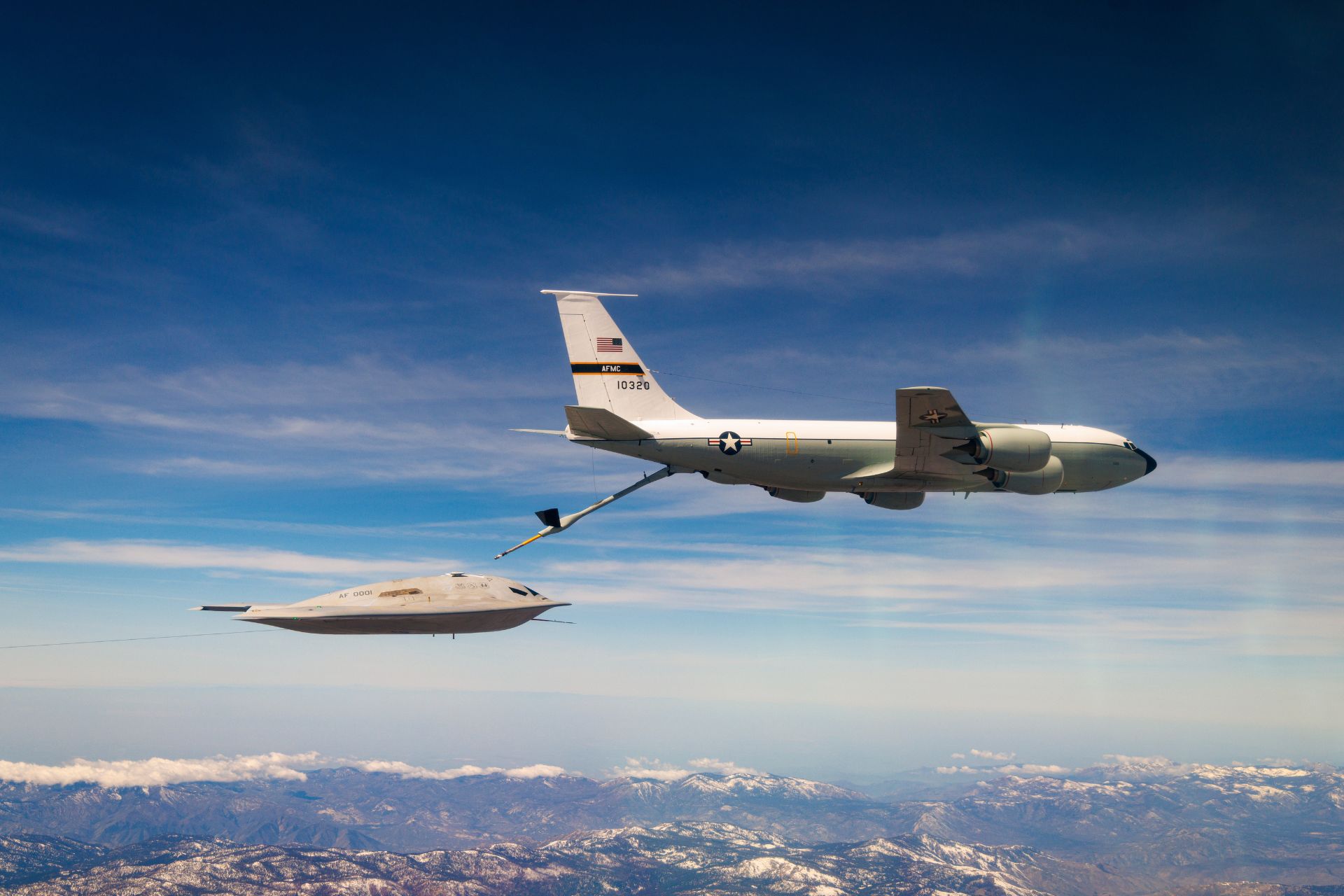 A B-21 Raider Bomber refuels from a KC-135 Stratotanker as part of testing to validate long-range penetrating strike capability and extend global operational reach. (Picture source: US DoD)