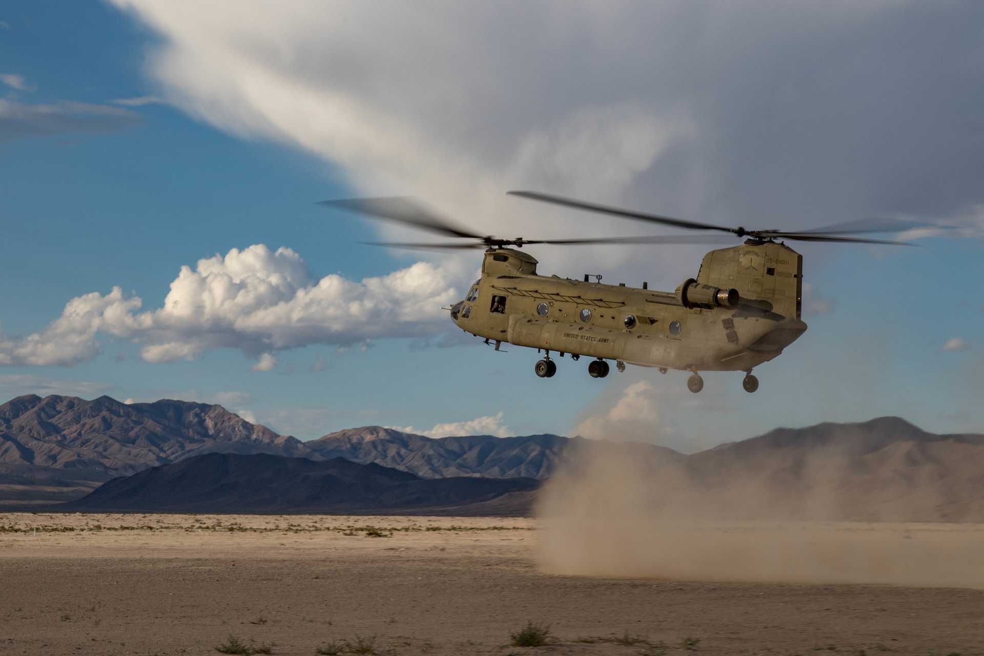 View of a U.S. Army National Guard CH-47F Chinook helicopter during landing operations, illustrating the heavy-lift platform’s operational role outside of the A2X flight test campaign.