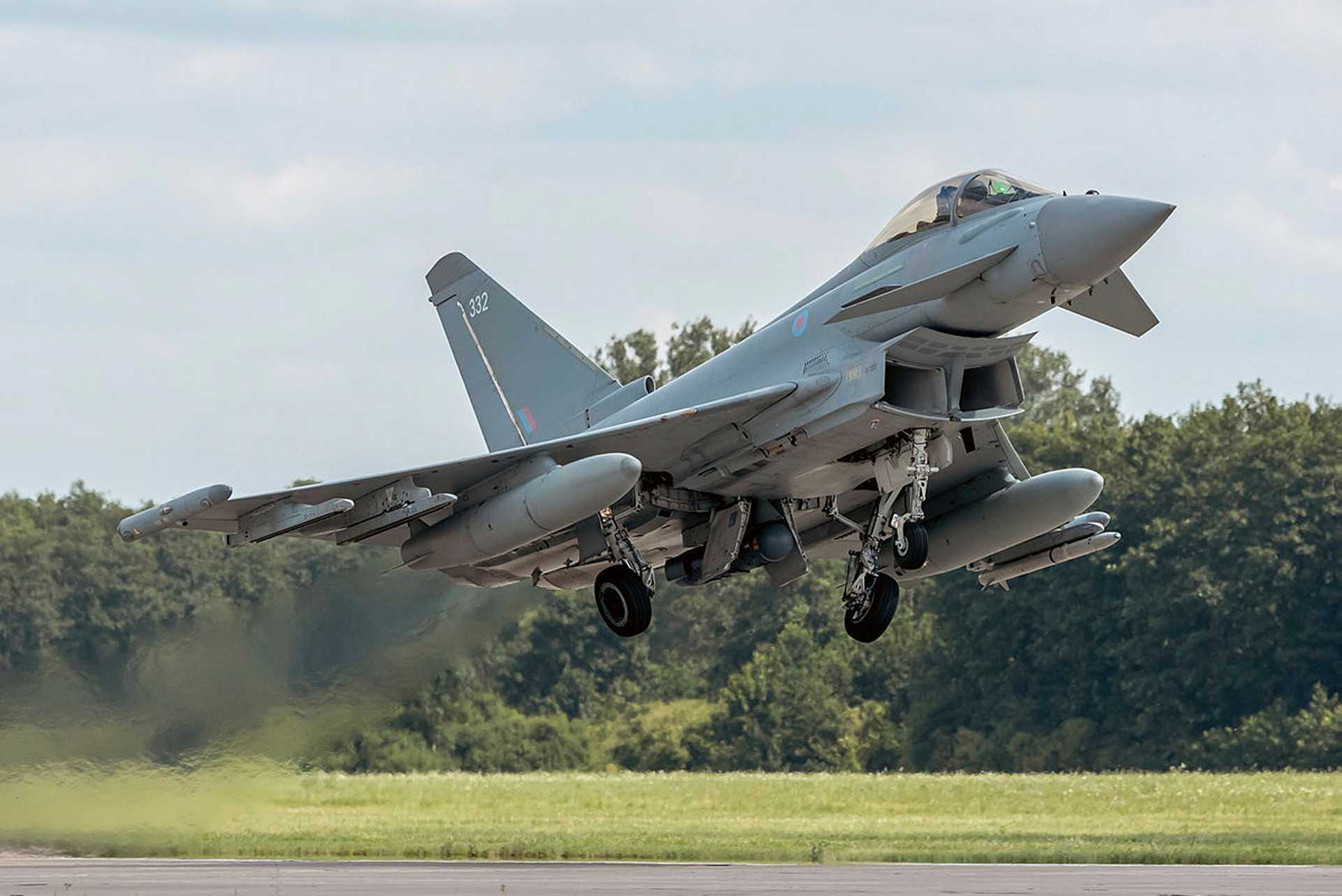 British Royal Air Force Typhoon fighter jet, soon to be equipped with the new ECRS Mk2 AESA radar, enhancing its ability to detect, track, and engage threats in complex air combat environments.
