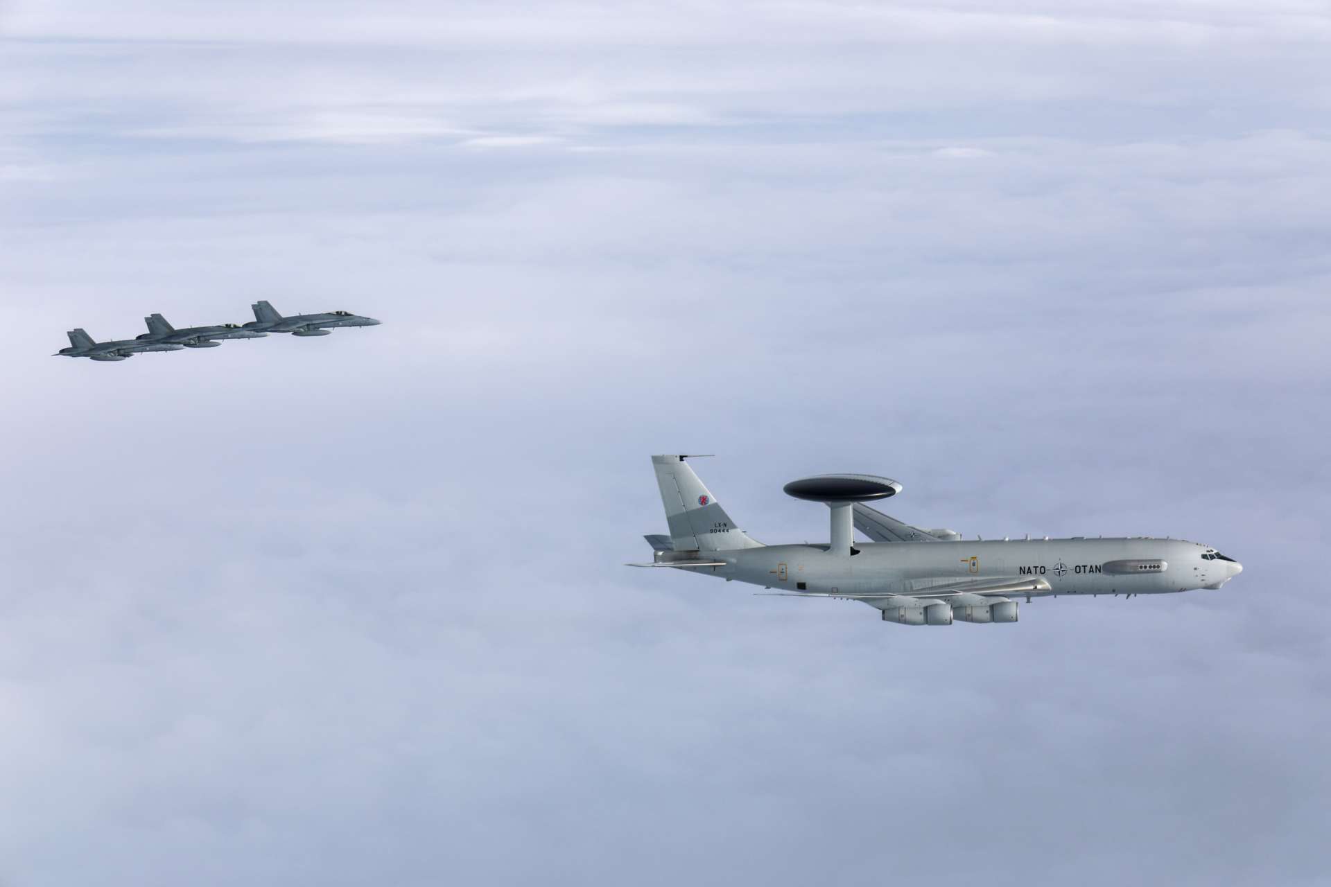 A NATO E-3A AWACS aircraft conducted its first operational mission over Finland, escorted by Finnish Air Force F/A-18 Hornets, marking a key step in integrating Finland into NATO&rsquo;s airborne command and air defense network (Picture Source: Finnish Air Force)