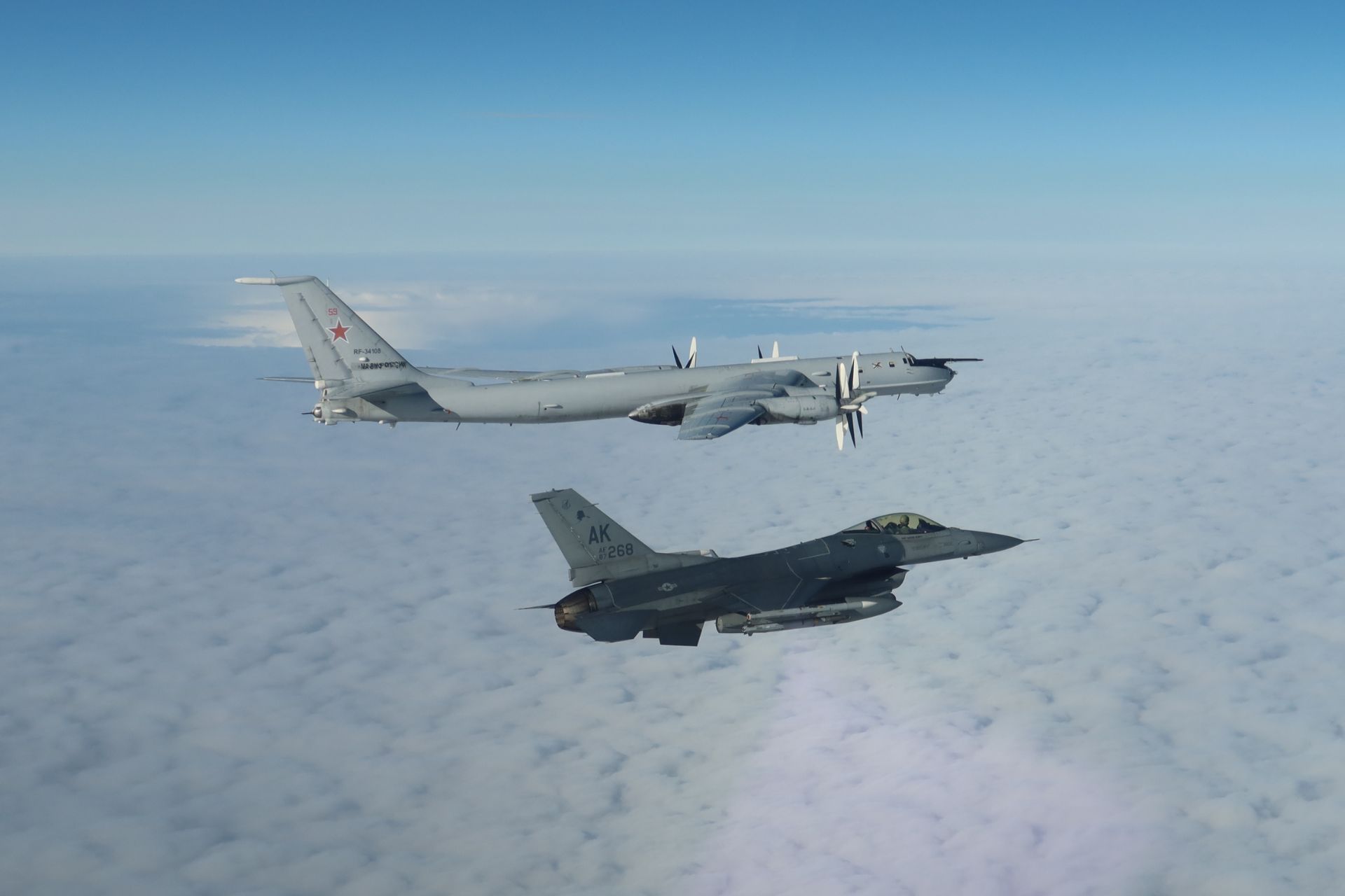 A NORAD F-16 Fighting Falcon intercepts a Russian Tu-142 Bear F/J in the Alaska Air Defense Identification Zone during Operation Noble Eagle in September 2024. (Picture source: US DoD)