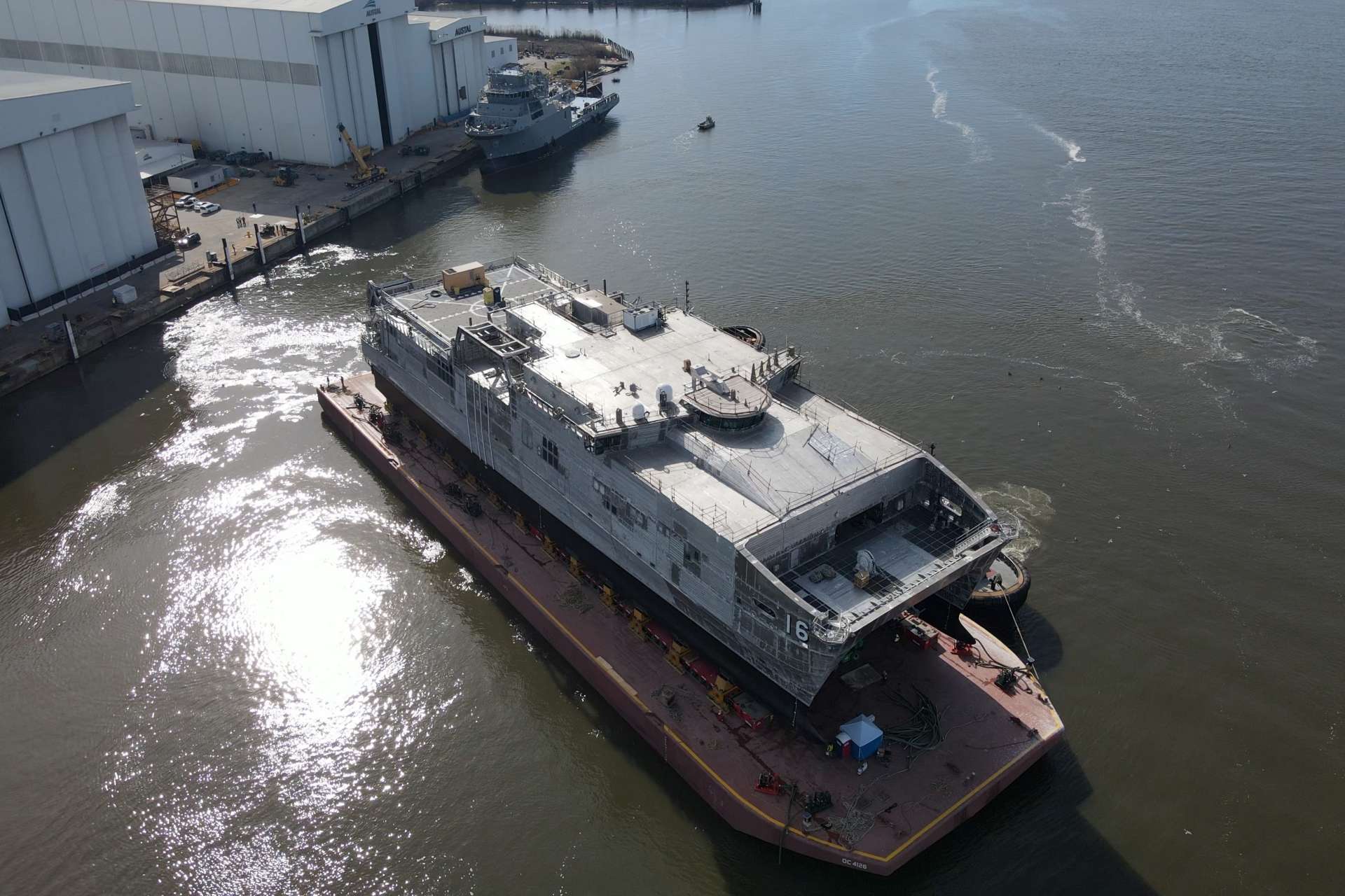 Future USNS Lansing EPF 16 floats out at Austal USA in Mobile on 25 February 2026 as the Navy’s final Spearhead class fast transport pairing 35 plus knot intra theater lift with Flight II Role 2 Enhanced medical spaces (Picture source: Austal USA).