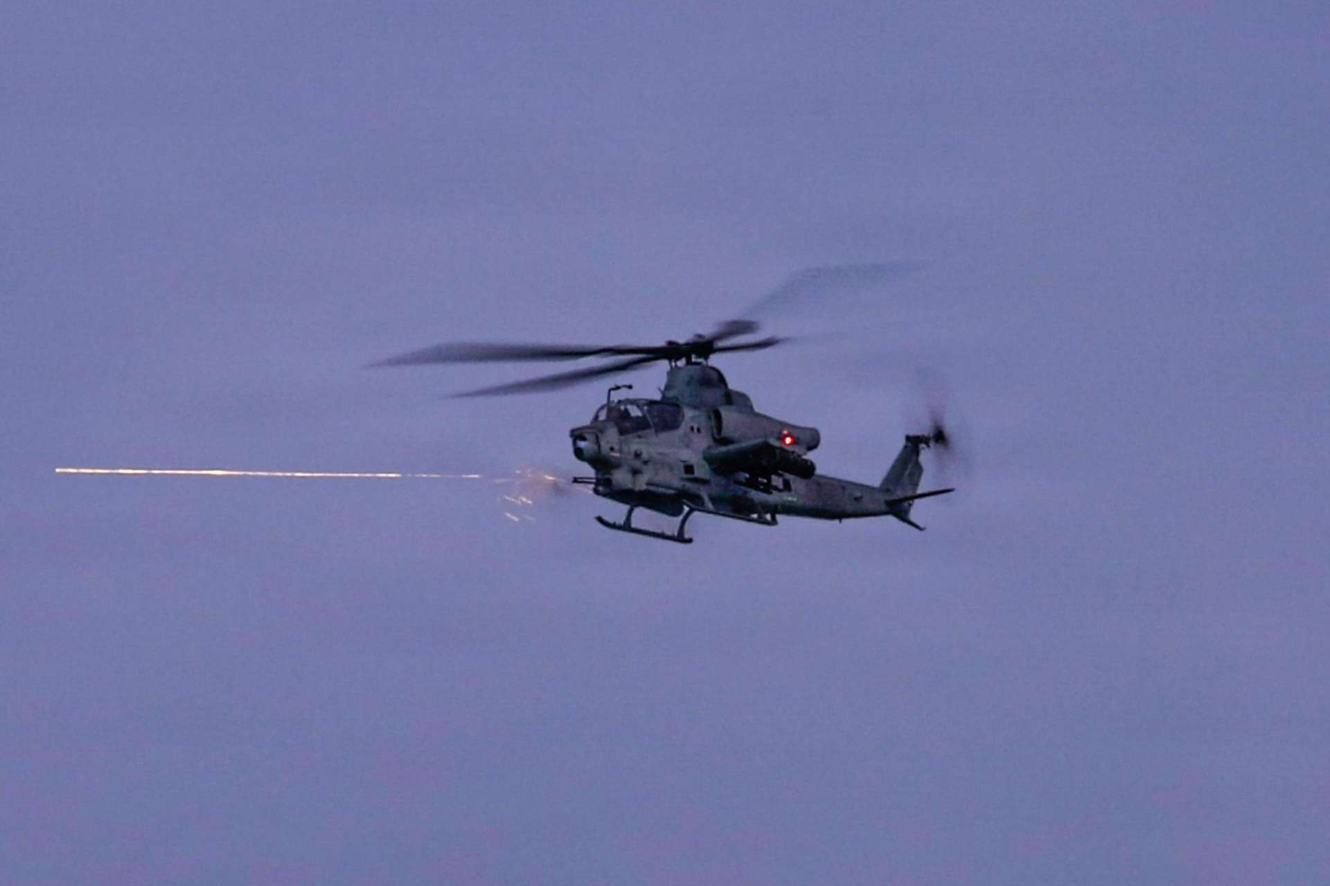 A U.S. Marine Corps AH-1Z Viper trained alongside Japanese ground forces off Okinawa during Iron Fist 26, sharpening close air support coordination for high-intensity coastal combat scenarios (Picture Source: U.S. Marines Corps)