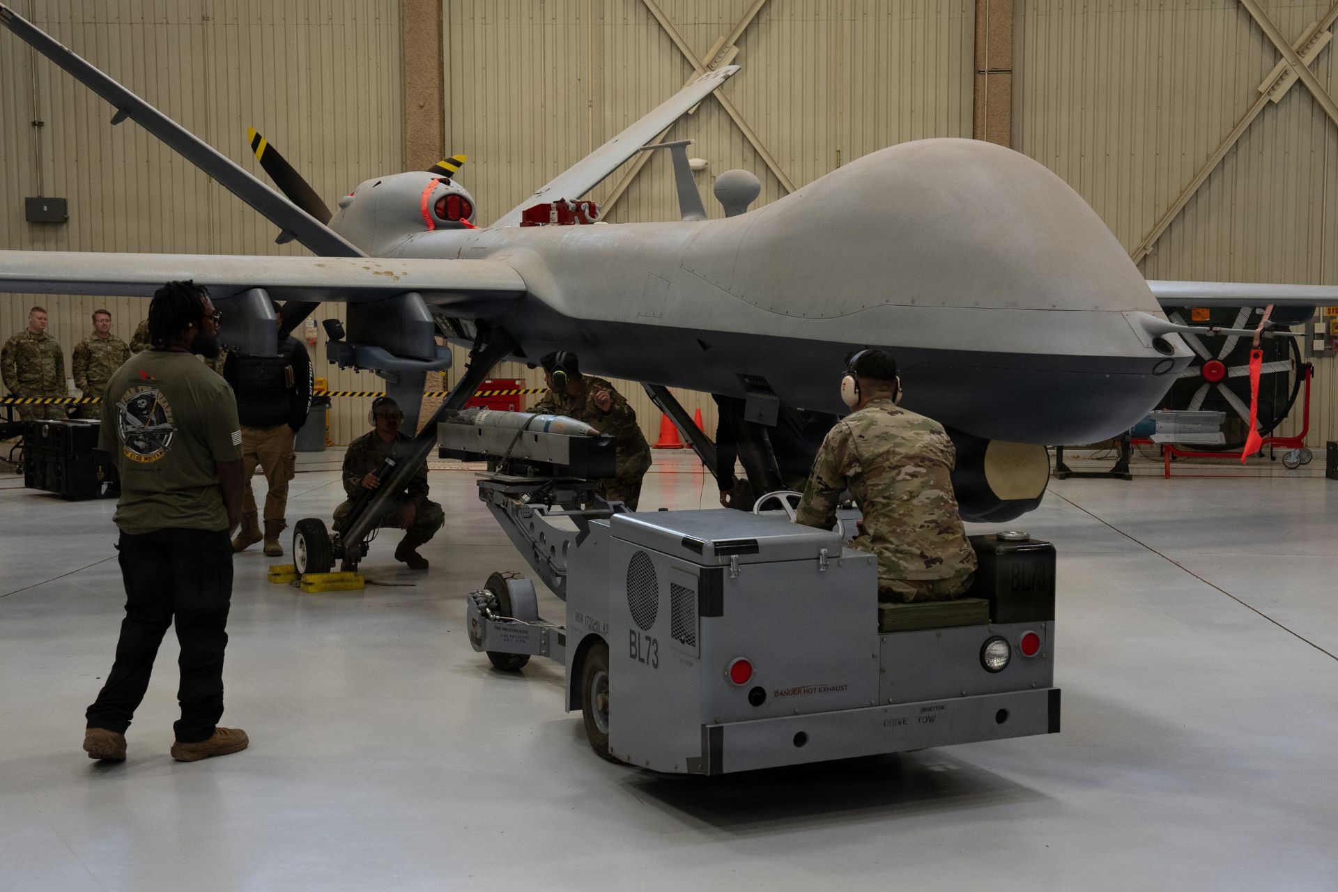 Air Commandos from the 27th Special Operations Wing load a GBU-39B Small Diameter Bomb onto an MQ-9 Reaper at Cannon Air Force Base on March 27, 2026, ahead of the weapon&rsquo;s operational deployment with AFSOC&rsquo;s MQ-9 fleet in spring 2026. (Picture source: US DoD)