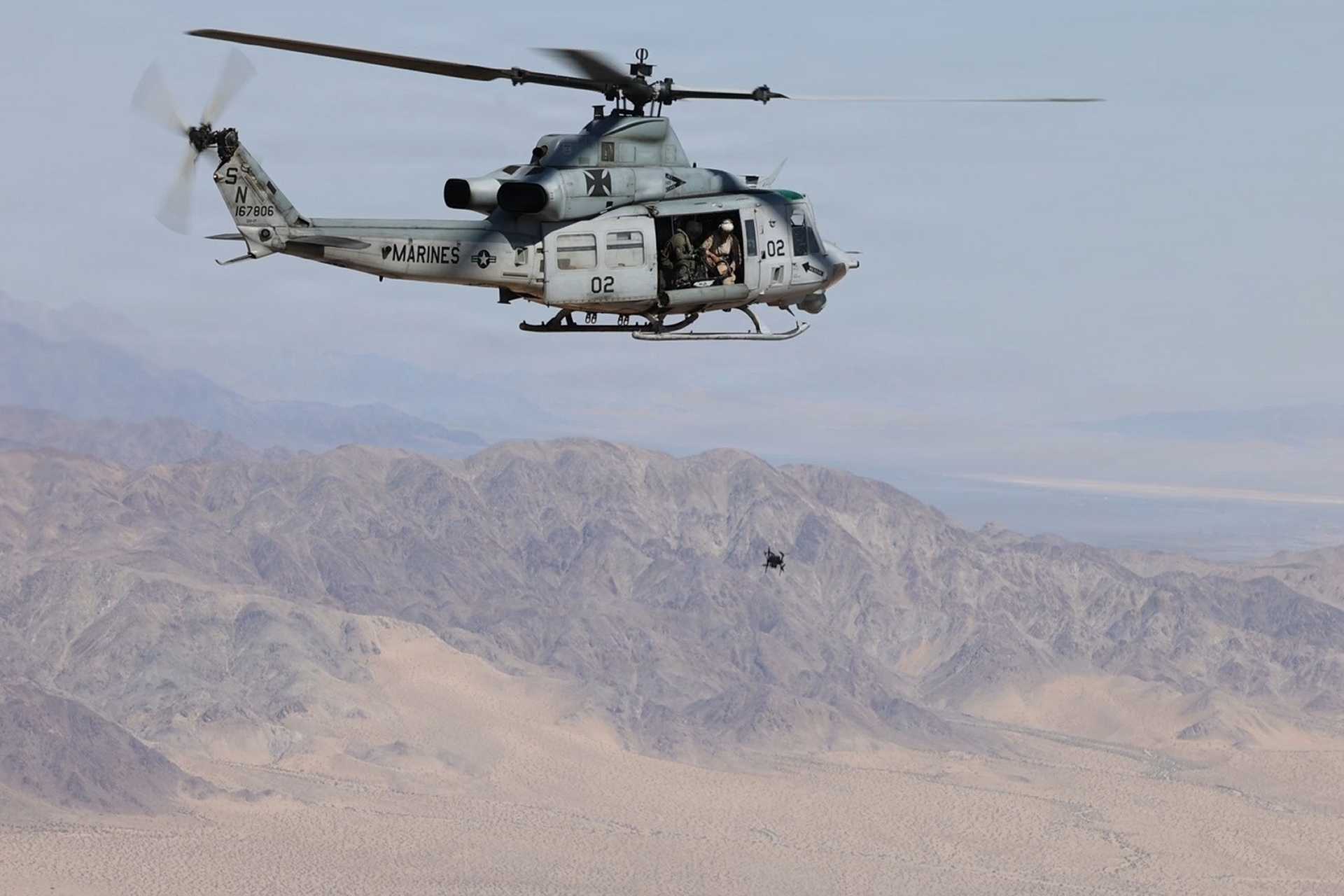 By using UH-1Y Venom helicopters as airborne control stations for Neros Archer FPV drones, the successful test allows Marines to launch and remotely guide low-cost attack drones toward targets while keeping helicopters and aircrews at safer distances from enemy air defenses. (Picture source: US Marines)