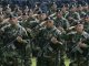 Some of the 200 soldiers of El Salvador&#039;s Army from Cuscatlan&#039;s 11th Battalion walk in formation during a ceremony  in San Juan Opico city