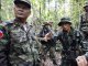A Thai commander talks to a Cambodian commander at Egal field in Preah Vihear