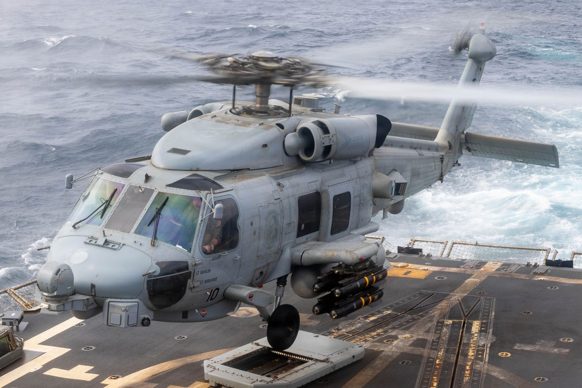 A Hellfire-armed U.S. Navy MH-60R Sea Hawk operating from USS Rafael Peralta provides the destroyer with a mobile airborne precision-strike capability that extends its surface-warfare reach across the Middle East (Picture Source: U.S. Navy)