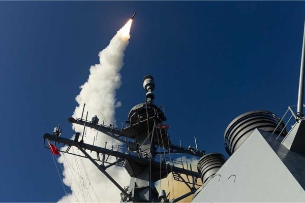 A U.S. Navy Aegis-equipped destroyer launches an SM-3 interceptor during a ballistic missile defense event, highlighting the fleet’s ability to engage ballistic threats outside the atmosphere.