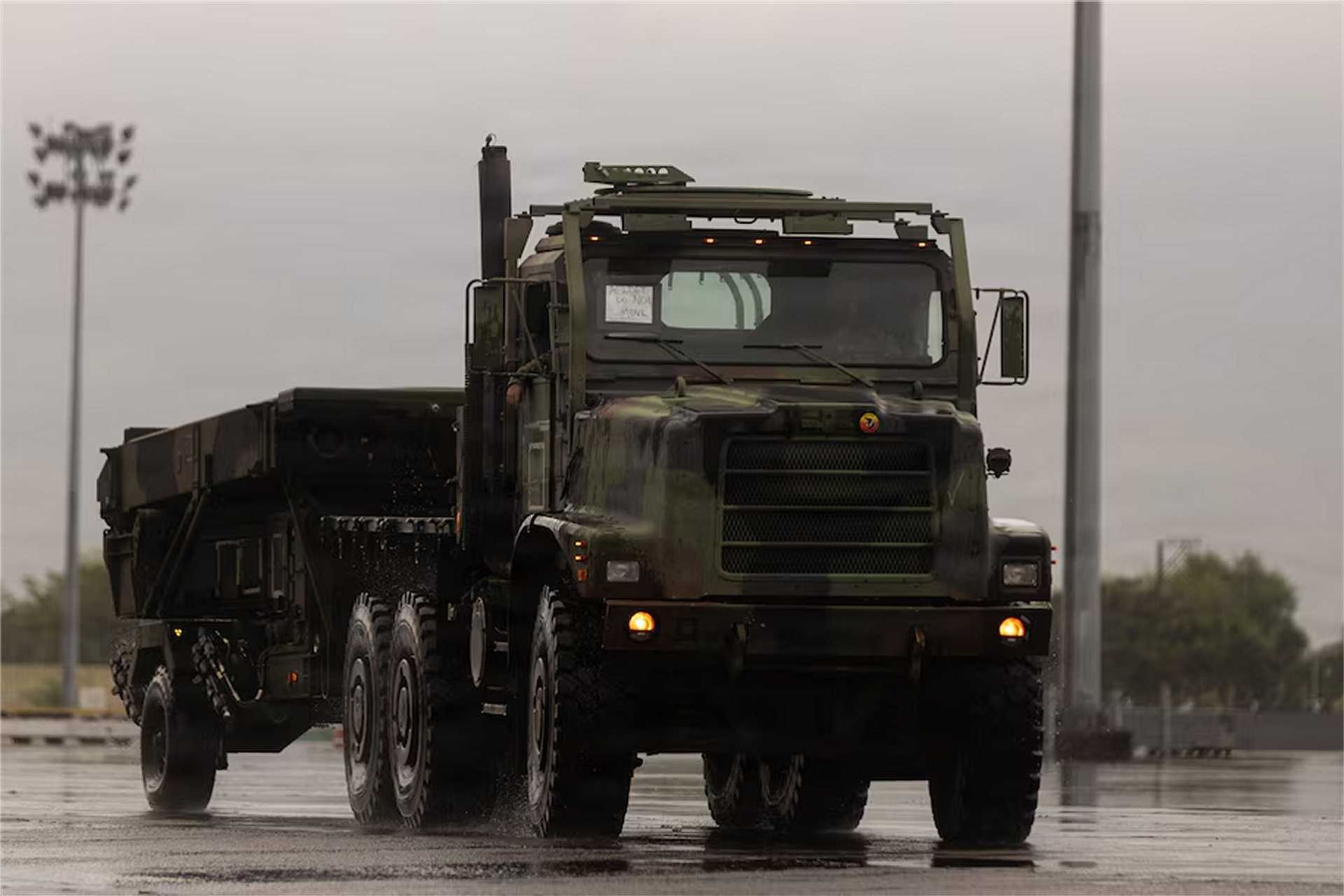 A U.S. Marine Corps Medium Tactical Vehicle Replacement tows an AN/TPS-80 Ground/Air Task-Oriented Radar during Marine Rotational Force–Southeast Asia training in the Philippines on August 17, 2026.