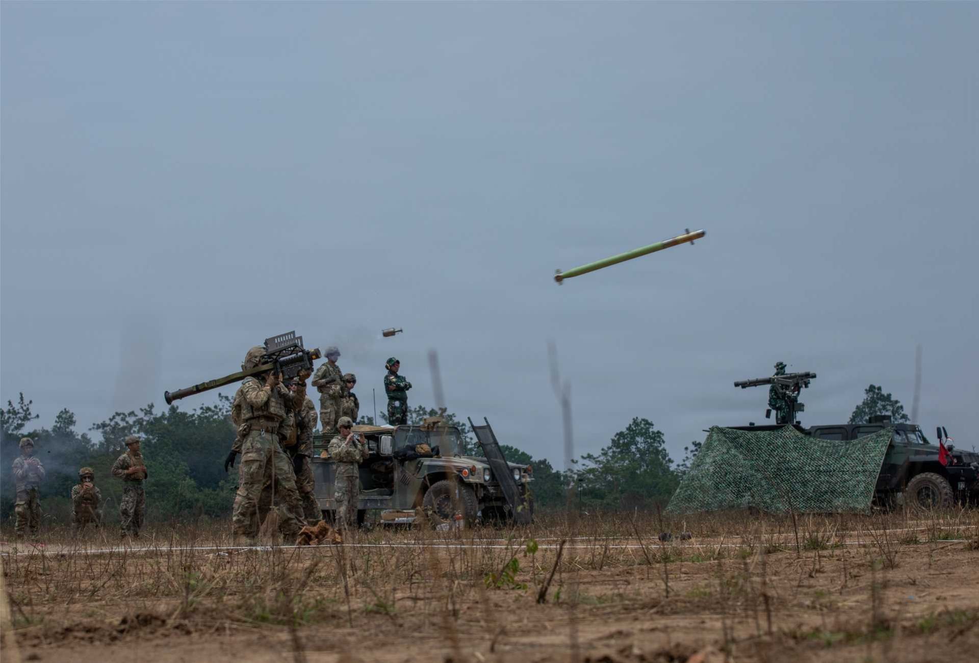 U.S. Army Spc. Dallas Demos, assigned to the 1st Battalion, 501st Parachute Infantry Regiment, 2nd Mobile Brigade Combat Team (Airborne), 11th Airborne Division, fires an FIM-92 Stinger missile during multinational short-range air-defense training in Indonesia, highlighting the Army’s push to give frontline infantry a direct counter-drone capability.
