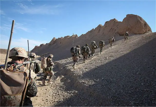 Soldiers from 2nd Battalion The Rifles and the Danish Battle Group begin a long day of patrolling in Nahr-e Saraj district during Operation ROZI ROSHAN 