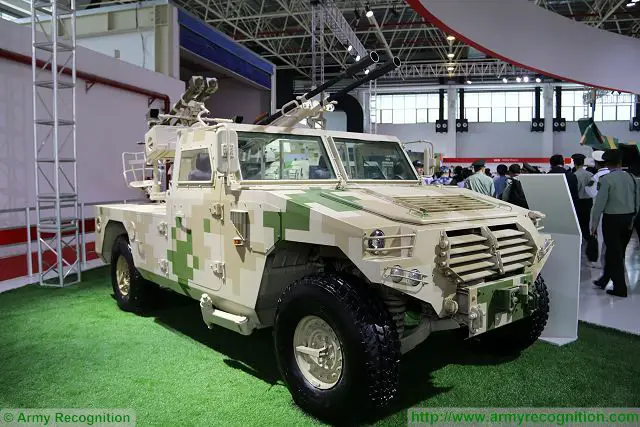 The Chinese Defense Company NORINCO launches the CS/AA6 at Zhuhai AirShow China 2016, a new gun/MANPADS (Man-portable air-defense system) short-range air defense light vehicle. The CS/AAS6 is based on a 4x4 light tactical vehicle Dong Feng Warrior.