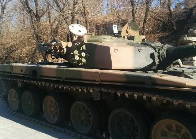 China has upgraded its home-made main battle tank Type 98 with MANPADS (Man-portable air-defense systems) missile system. A picture releases on Internet shows two launchers of short-range air defense system mounted to the right side of the turret.