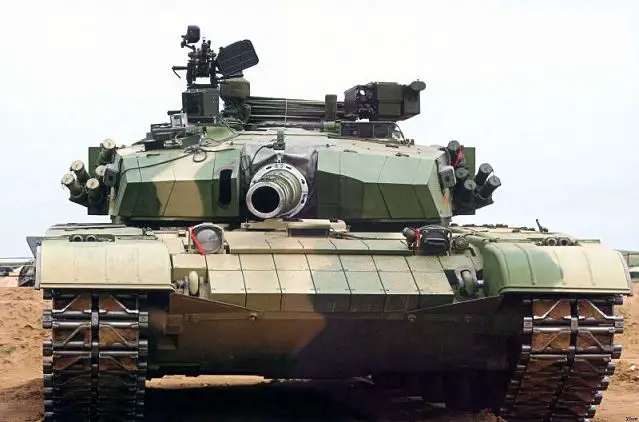 Chinese army uses a new designed main battle tank, the Type 99G during military exercise held by the the Shenyang Military Region near the border between China and North Korea in December 2013. The ZTZ99G has newly designed features and active protection system (APS). The new tank is larger with an autonomous commander thermal imaging viewer. The electro-optical countermeasures devices have been replaced by a new design.