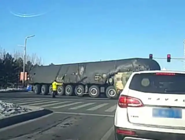 China would deployed several of its new multi-warhead road-mobile intercontinental ballistic missile (ICBM) Dongfeng-41 or DF-41 in different locations in China. Pictures released on Internet showing DF-41 in in the street of Daqing in Hei Long Jing province of China. 