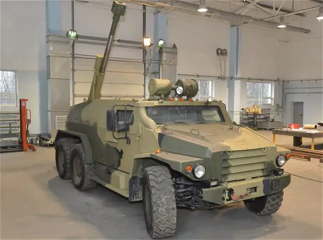 A picture releases Monday, January 20, 2014, on a Russian military blog shows that Russia develops a new light self-propelled artillery system based on the 6x6 light tactical vehicle Volk (Wolf in English) VPK-39273 with a 120mm gun 2B16 Nona-K mounted at the rear of the chassis.