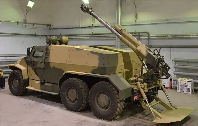 A picture releases Monday, January 20, 2014, on a Russian military blog shows that Russia develops a new light self-propelled artillery system based on the 6x6 light tactical vehicle Volk (Wolf in English) VPK-39273 with a 120mm gun 2B16 Nona-K mounted at the rear of the chassis.
