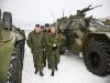 Russia's President Dmitry Medvedev and Defence Minister Anatoly Serdyukov inspect new armoured vehicles at the firing ground "Shot" in the Moscow region, January 14, 2010.