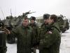 Russia's President Dmitry Medvedev and Defence Minister Anatoly Serdyukov inspect new armoured vehicles at the firing ground "Shot" in the Moscow region, January 14, 2010.