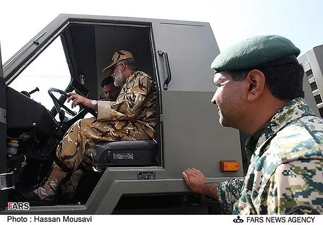 Iranian Army's Ground Force Brigadier General Ahmad Reza Pourdastan inside the new Neinava 4x4 light tactical vehicle at the Research and Self-Sufficiency Jihad Organization of the Iranian Army.